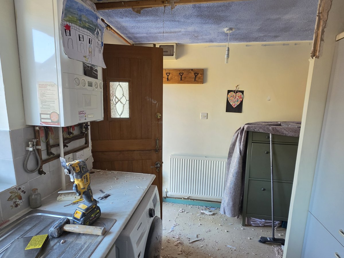 Old artex ceiling mid-removal